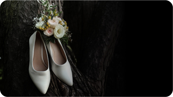 shoes and flower hanging from tree